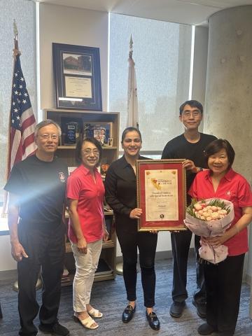 Senator Wahab poses with her honorees, Friends of Children with Special Needs.