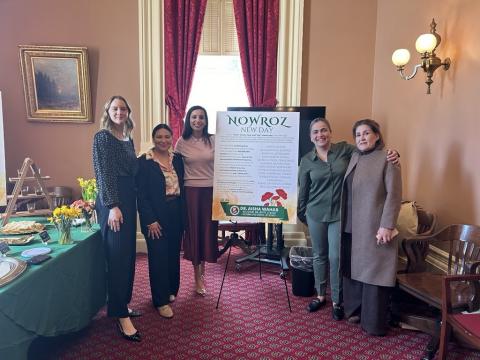 Senator Wahab poses with her team.